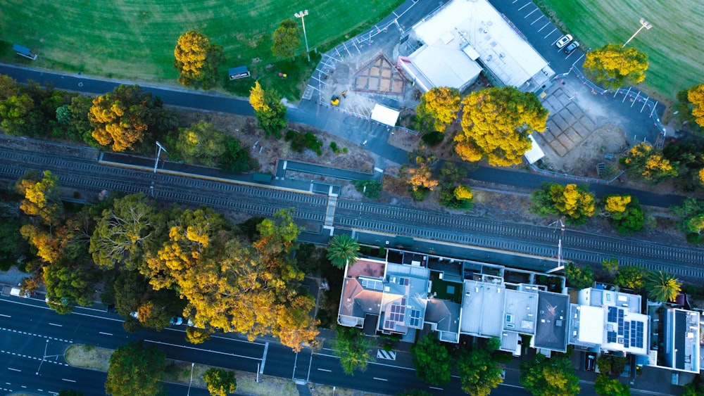 an aerial view of a house surrounded by trees