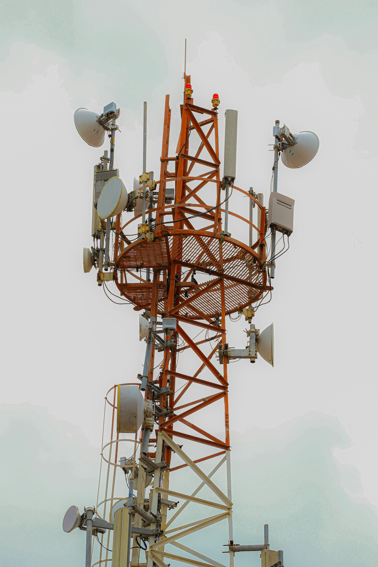 a tower that has several antennas on top of it