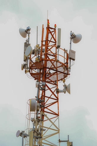 a tower that has several antennas on top of it