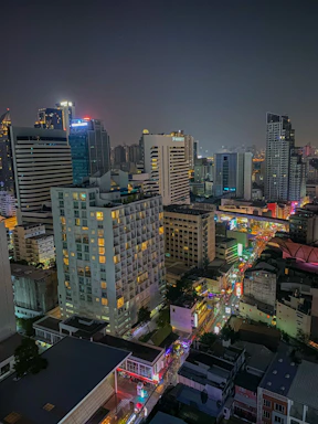 Night view of a cityscape highlighting energy-efficient buildings.