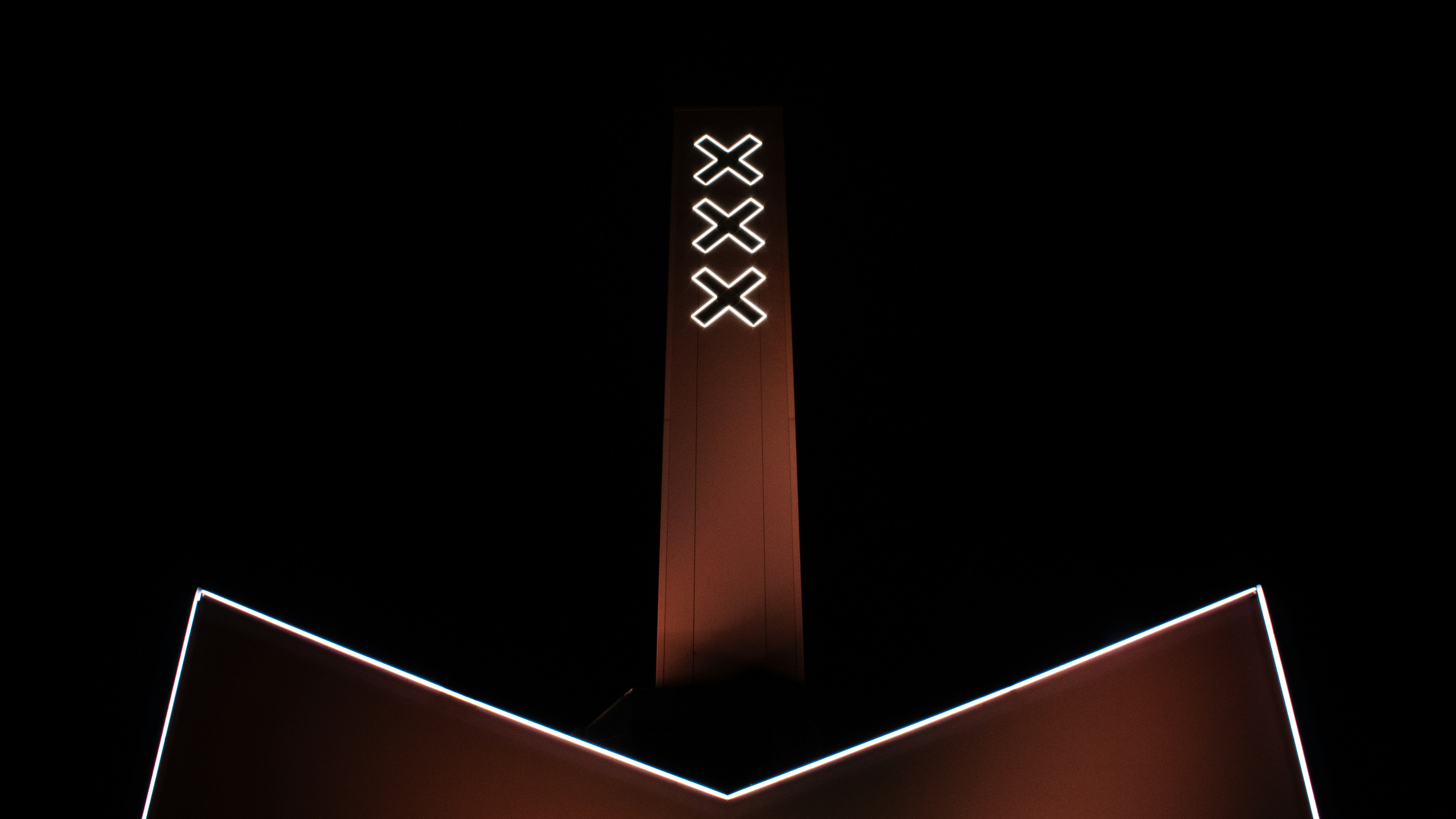 a tall building with a clock at the top of it
