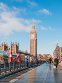 a large clock tower towering over a city