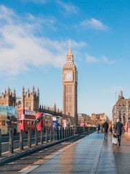 a large clock tower towering over a city