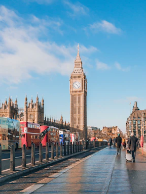 a large clock tower towering over a city