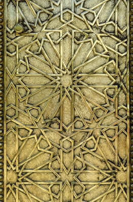 A beautifully detailed gold tier artwork displaying intricate patterns.