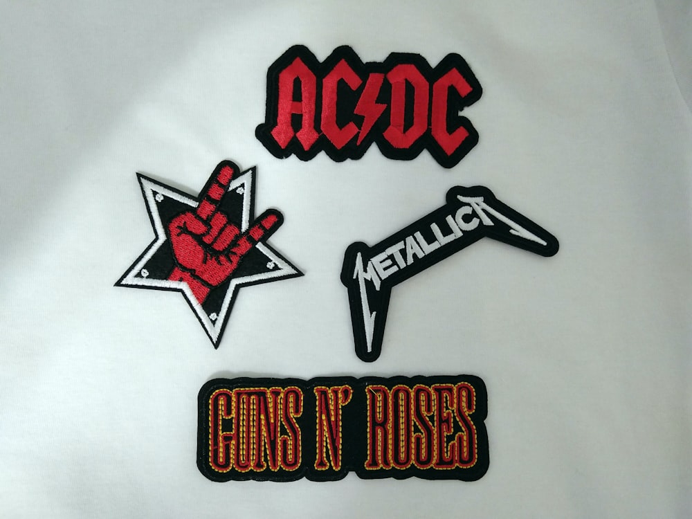 a group of stickers that say guns n roses