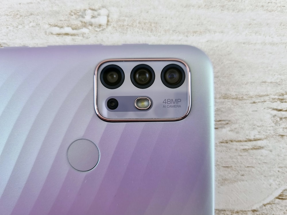 a close up of a purple cell phone