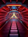 a red and blue tunnel with a long set of stairs