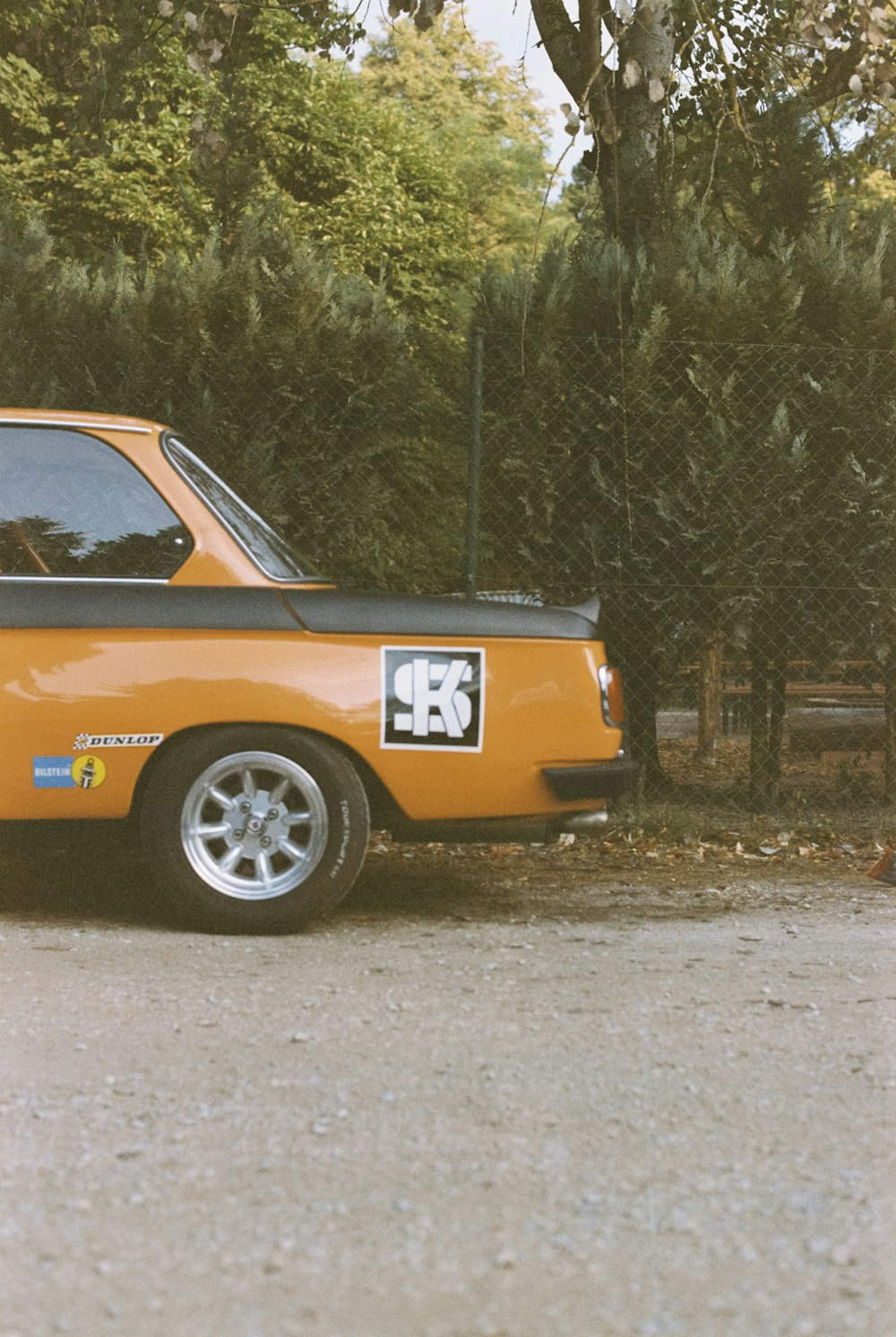 a yellow truck with a number 33 on the side of it