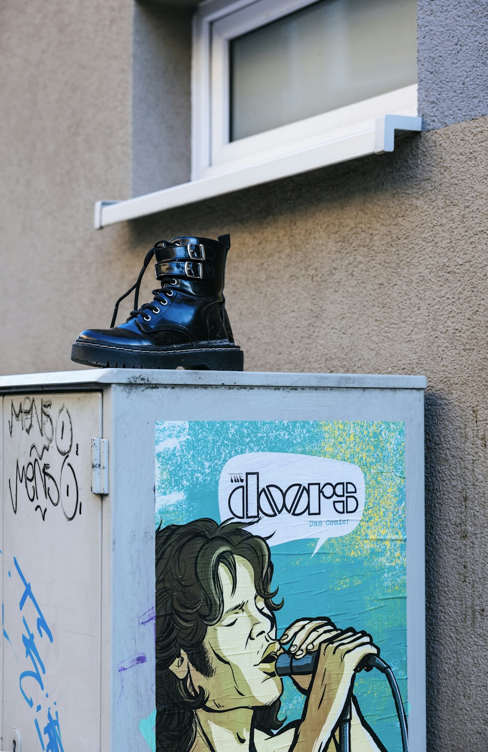 a pair of shoes sitting on top of a box