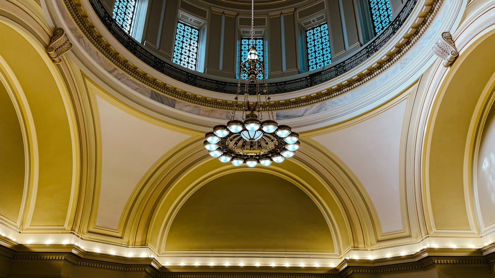 a chandelier hanging from the ceiling of a building