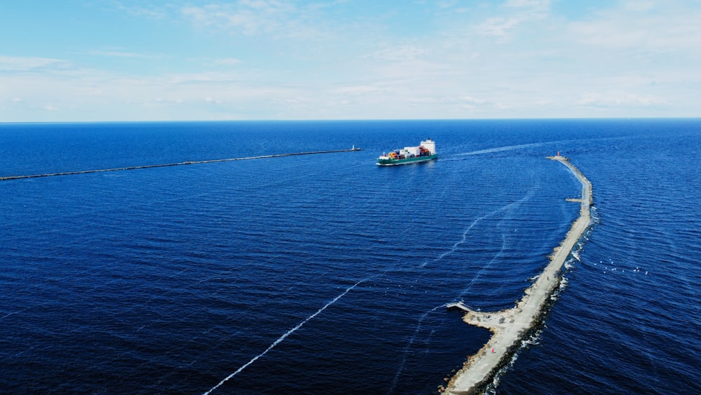 a large boat traveling across a large body of water