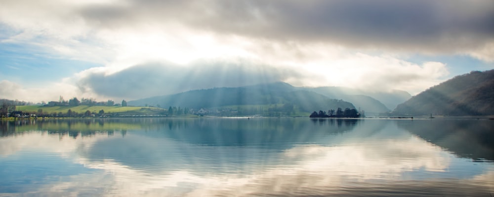 a large body of water surrounded by mountains