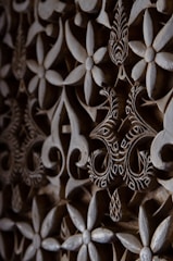 Custom laser-engraved wooden home décor piece with intricate patterns.