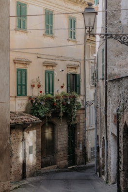 A charming European village with cobblestone streets and flower-filled balconies.