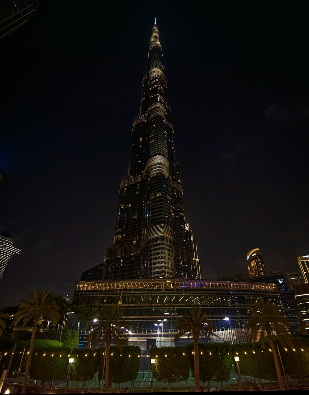 a very tall building lit up at night