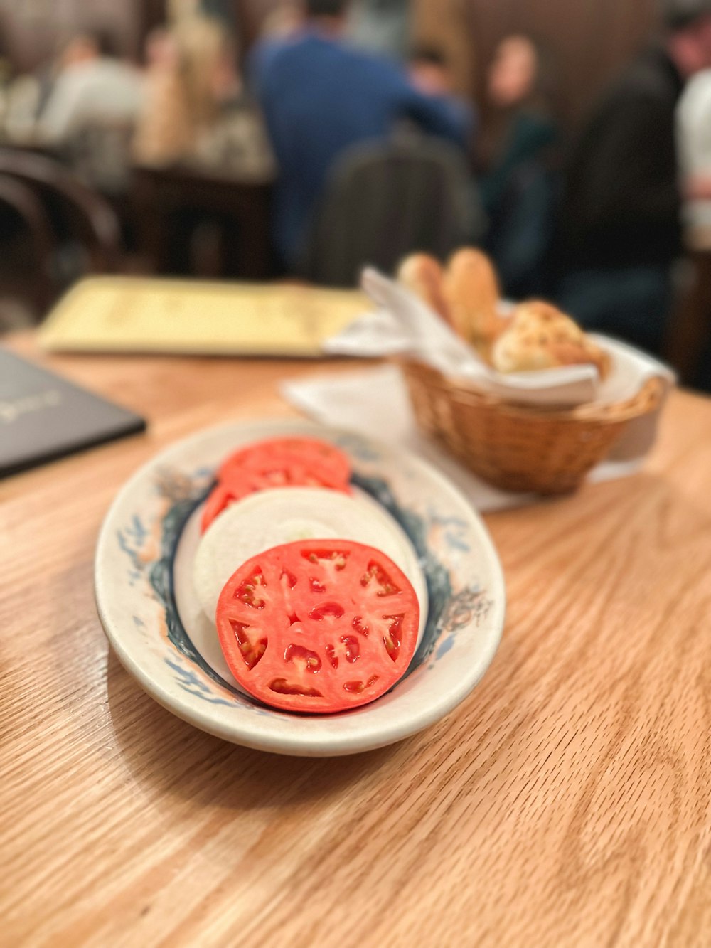 a plate of food on a table in a restaurant