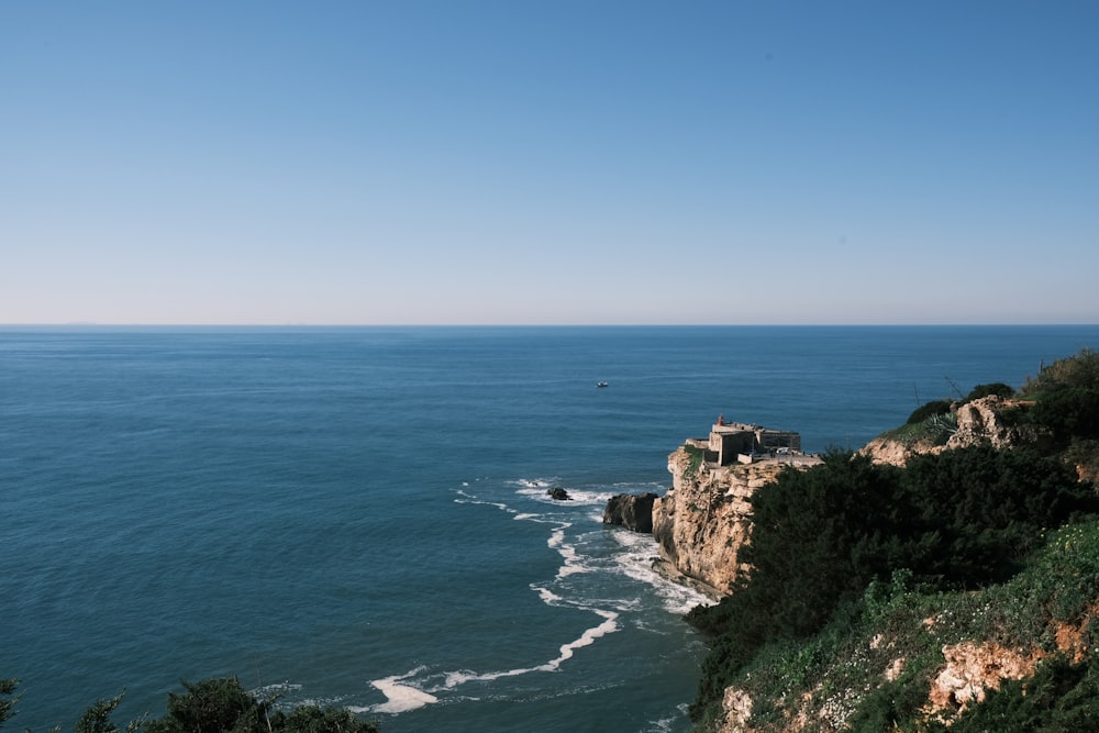 a view of the ocean from a cliff