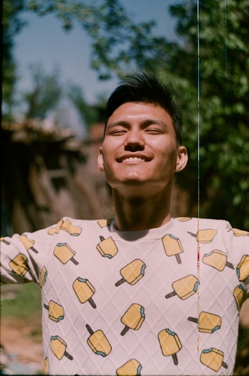 A happy person outdoors, feeling energized and healthy, symbolizing improved immunity