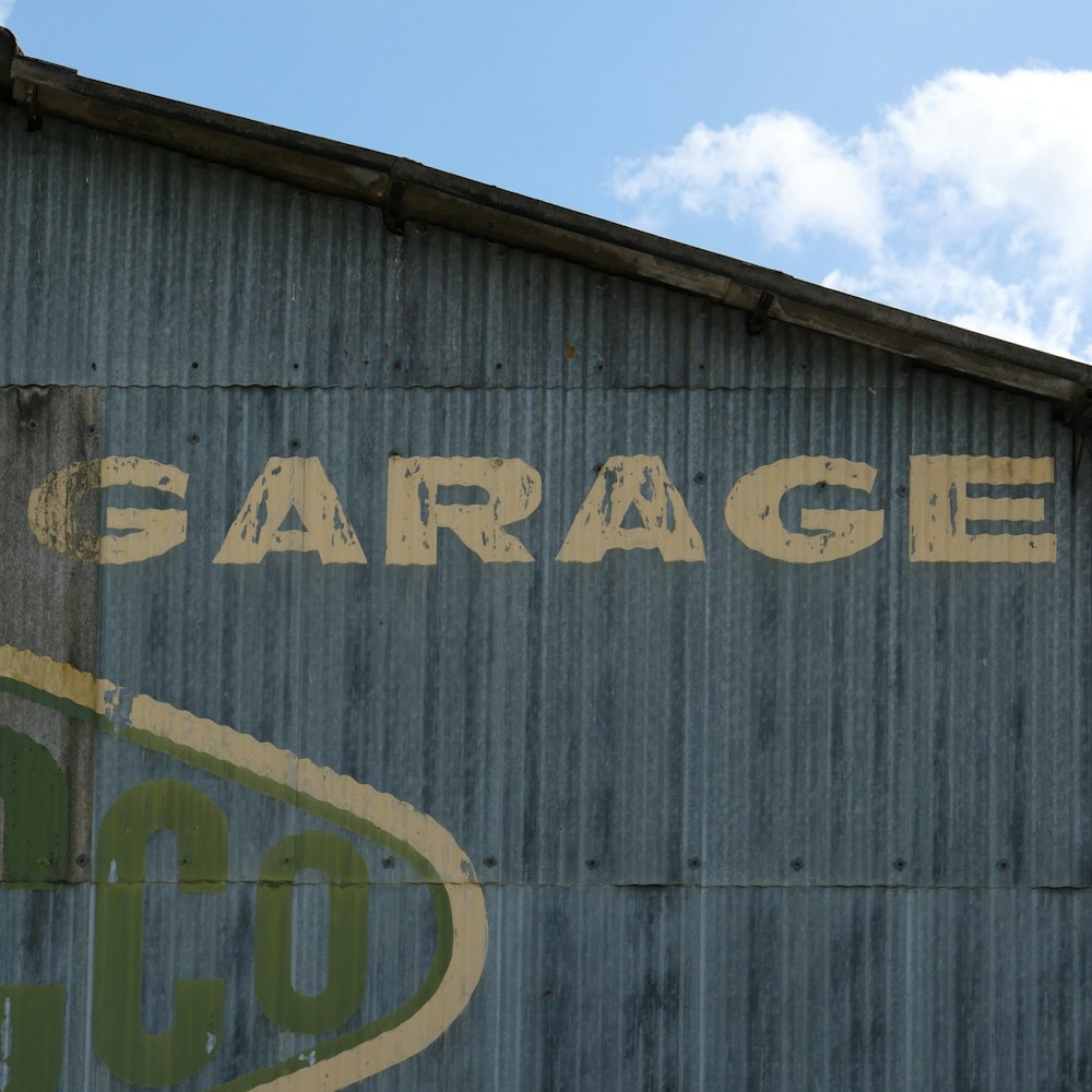 a sign on the side of a building that says garage