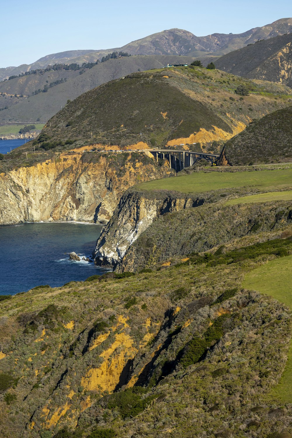 a large body of water surrounded by mountains