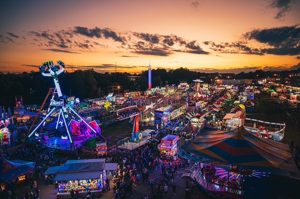an aerial view of a carnival at night