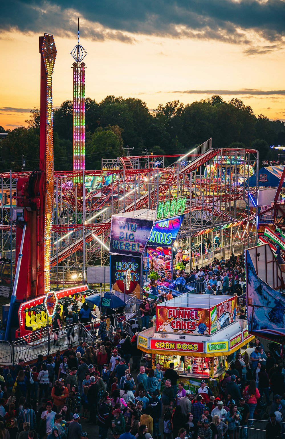 a carnival filled with lots of rides and carnival rides