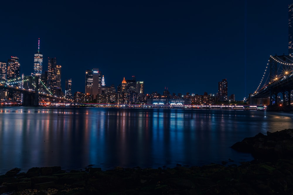 a view of a city at night from across the water