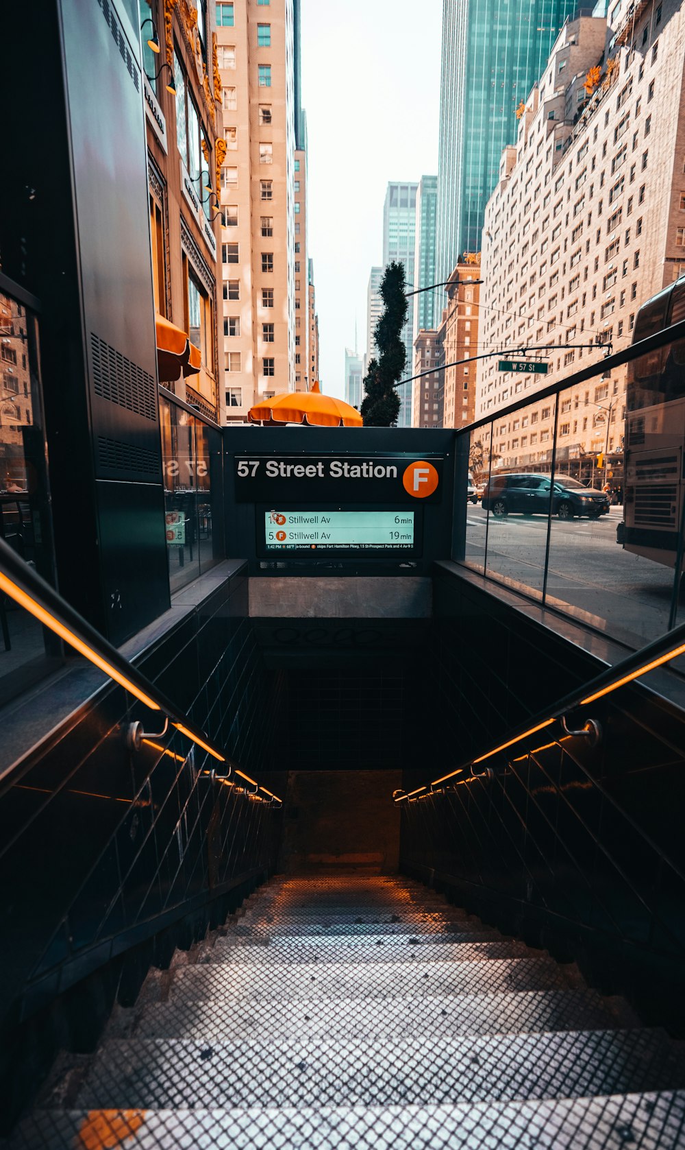 a set of stairs leading to a street station