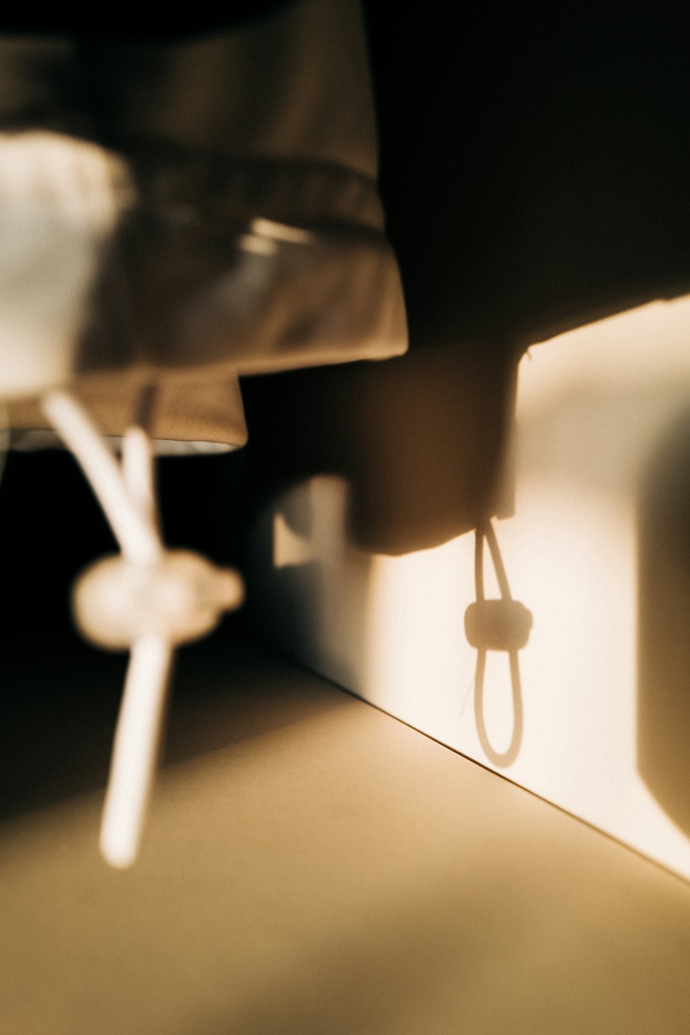 a close up of a toothbrush and a toothpaste dispenser