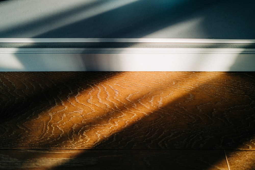 a close up of a door handle on a wooden door