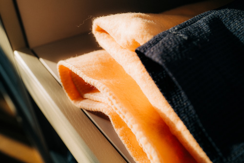 a close up of a towel on a window sill