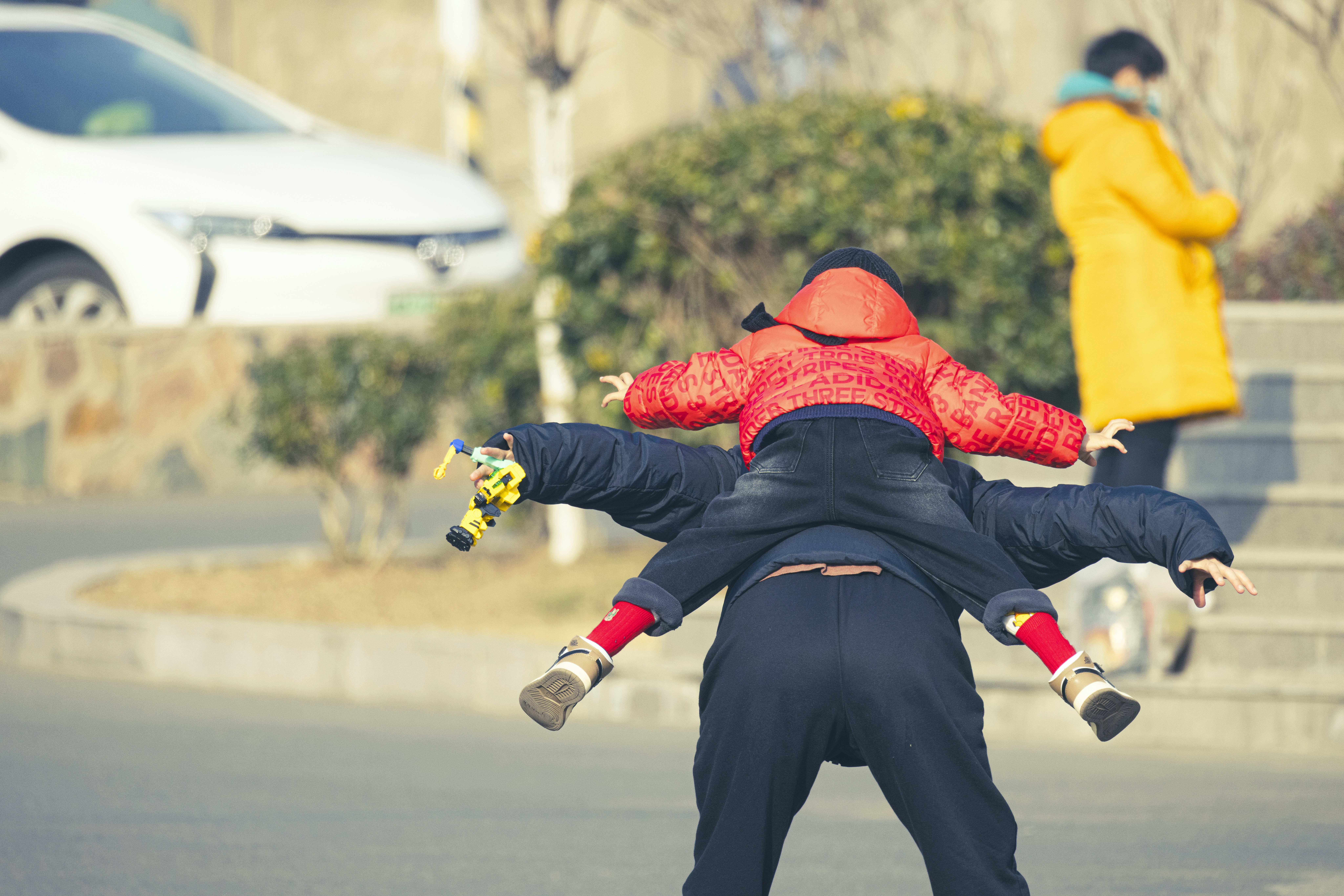 a couple of people that are on a skateboard
