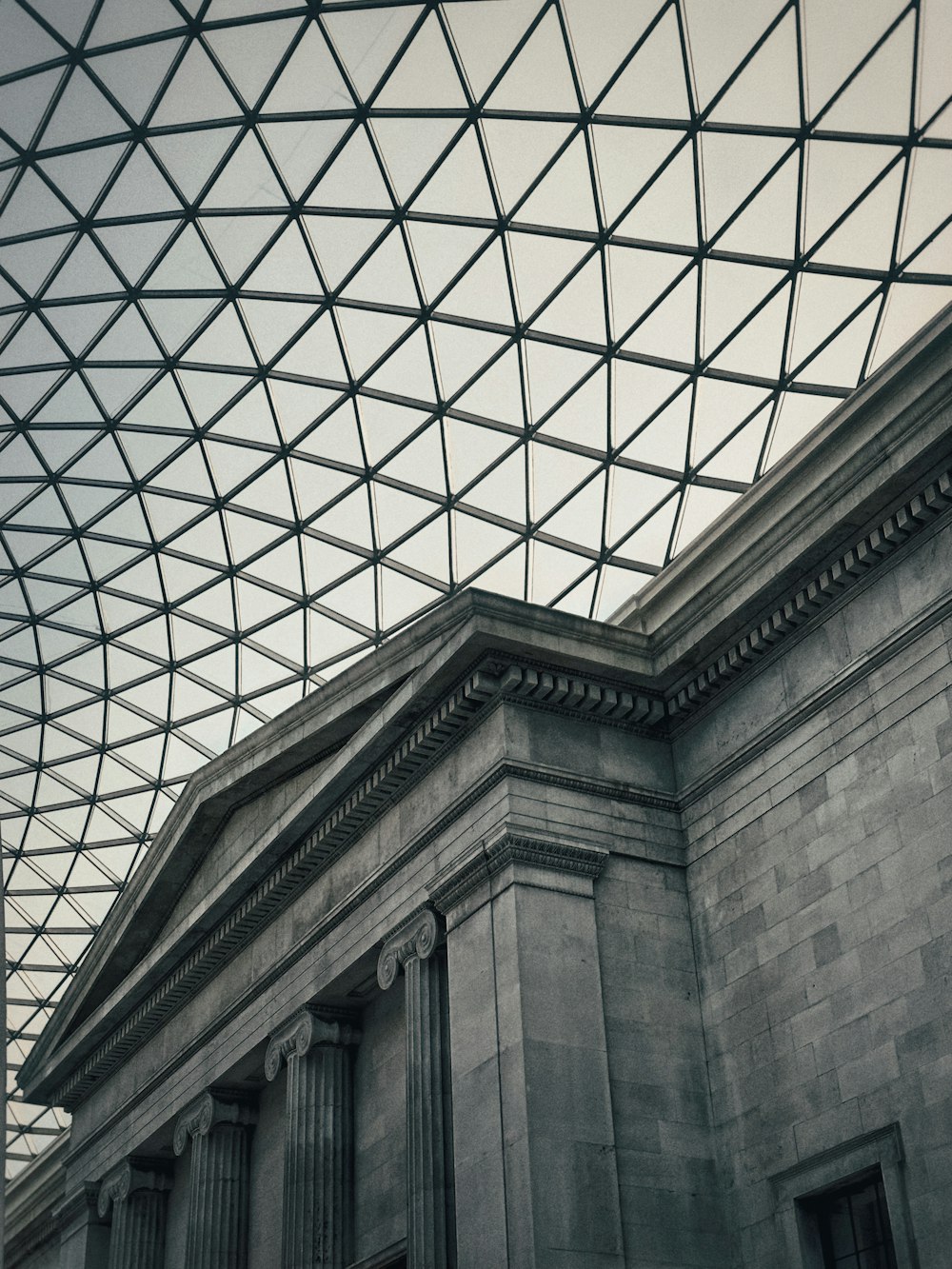 a very large building with a glass roof