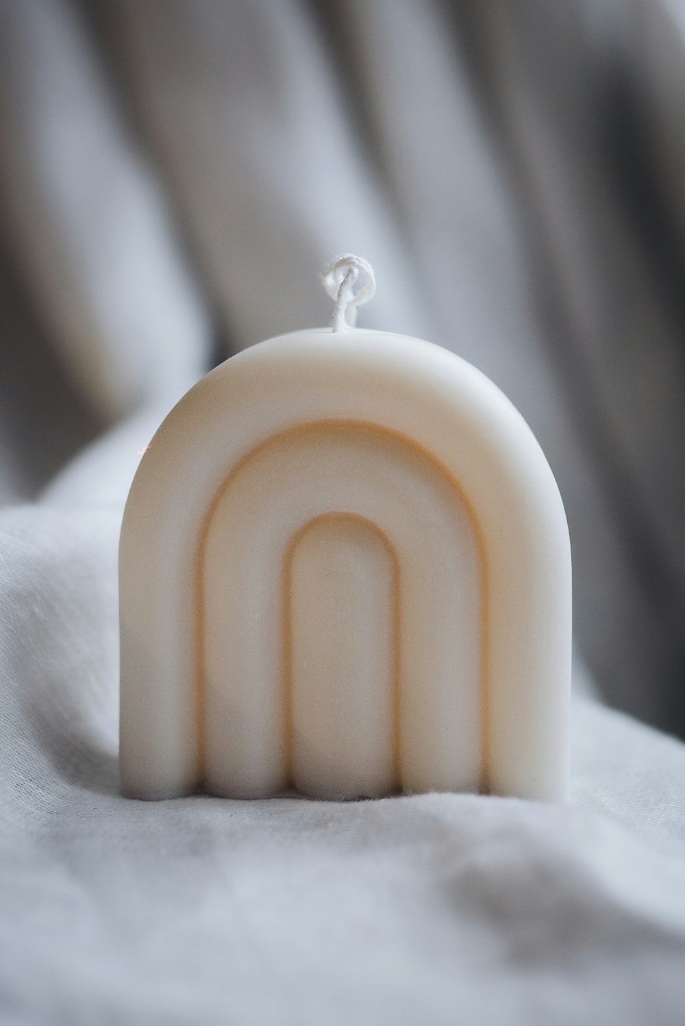 a close up of a soap bar with a ring on it