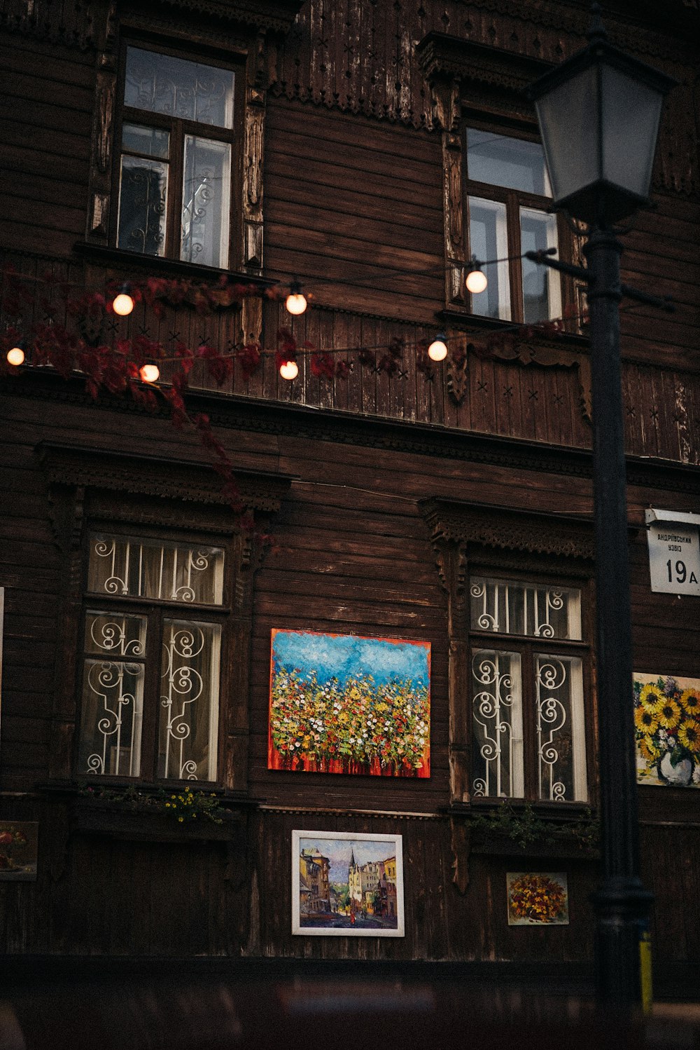 a building with a lot of windows and a street light