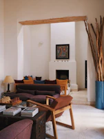A styled living room featuring maderavibe furniture pieces blending rustic charm with modern edge.