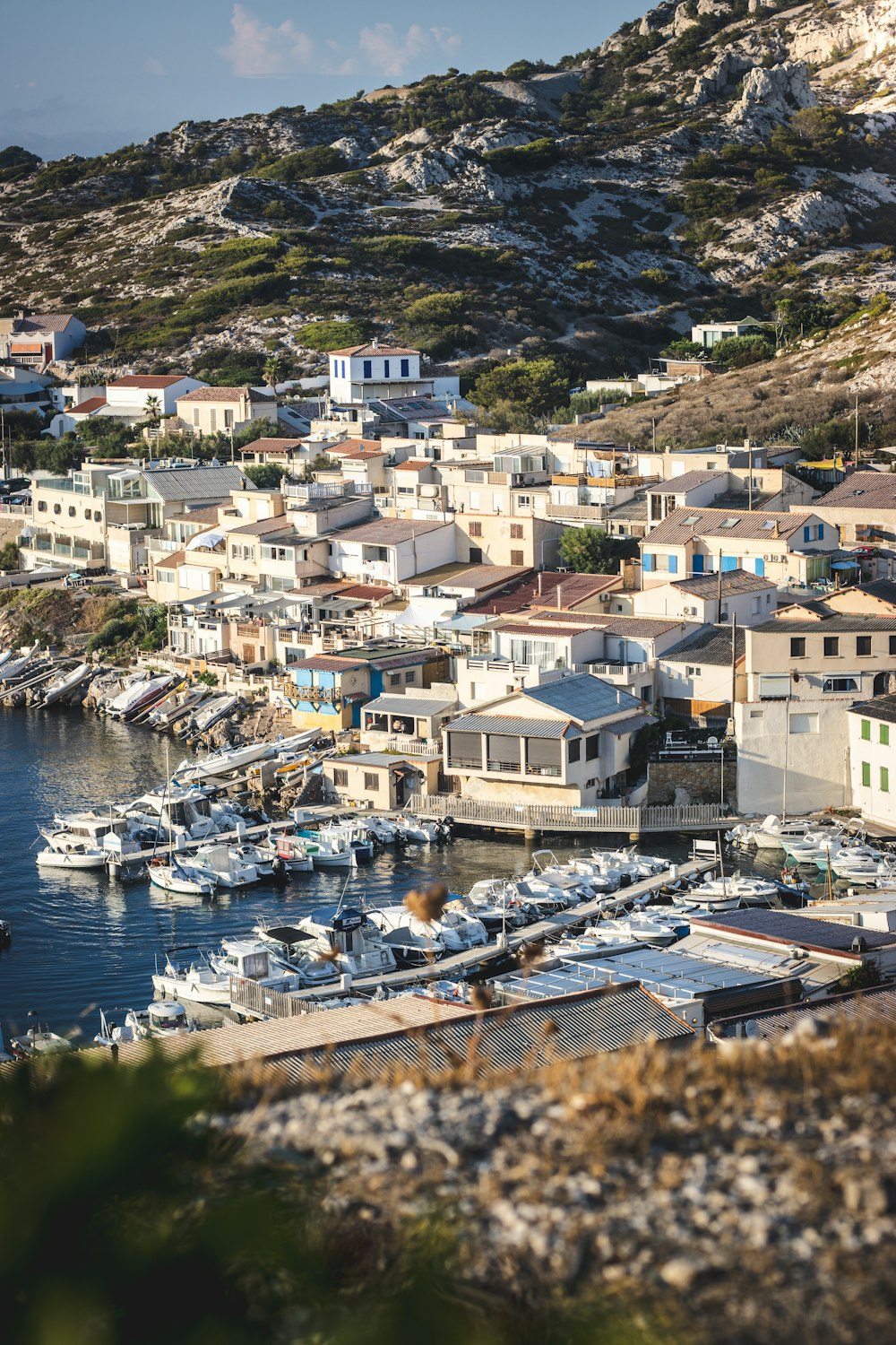 a view of a harbor with many boats in it