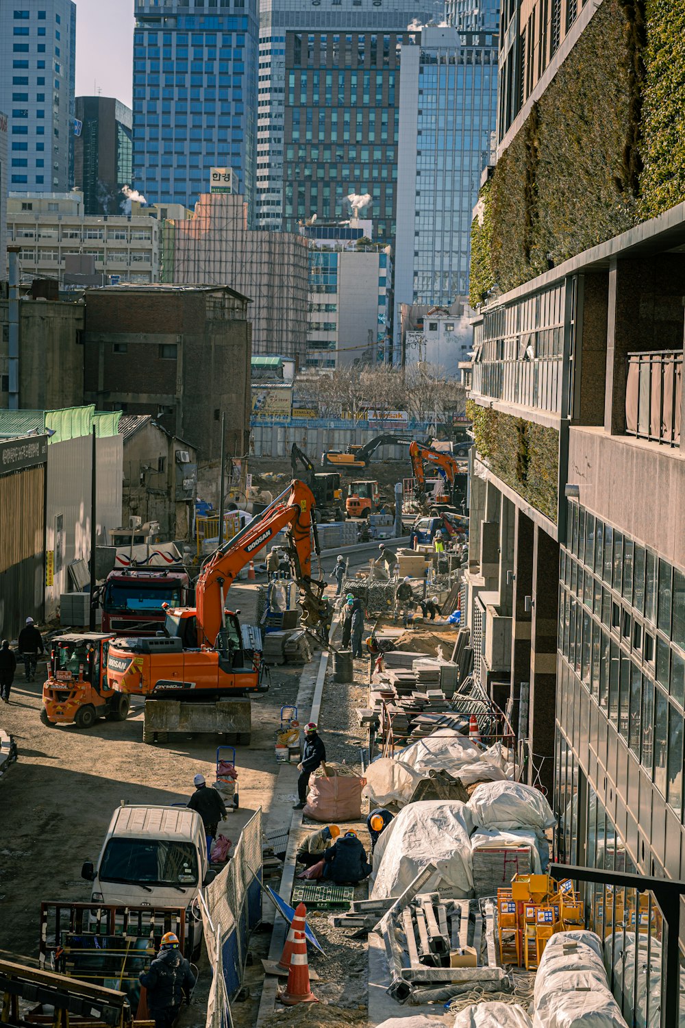 a construction site with a crane and construction equipment