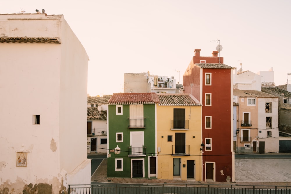 a row of colorful buildings next to each other