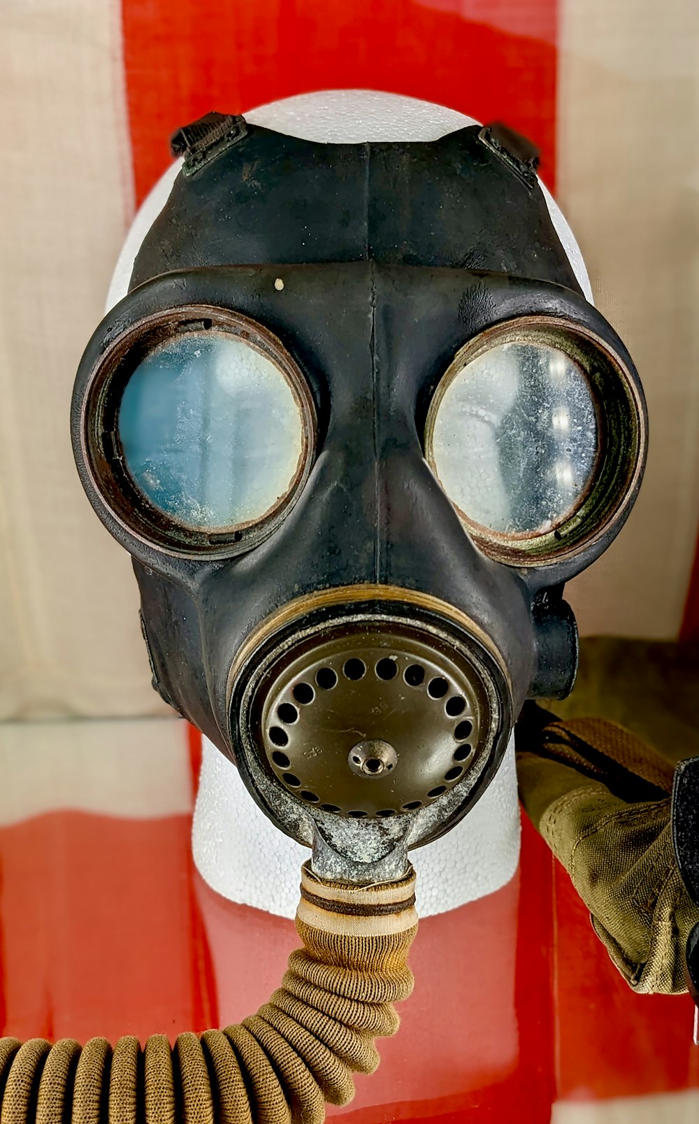 a gas mask with goggles attached to it