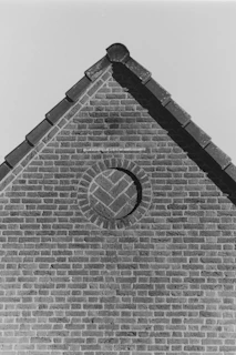 Detail of a decorative brick pattern on an exterior wall