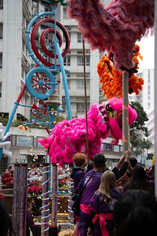 Colorful procession with lion dance performers celebrating the temple’s birthday