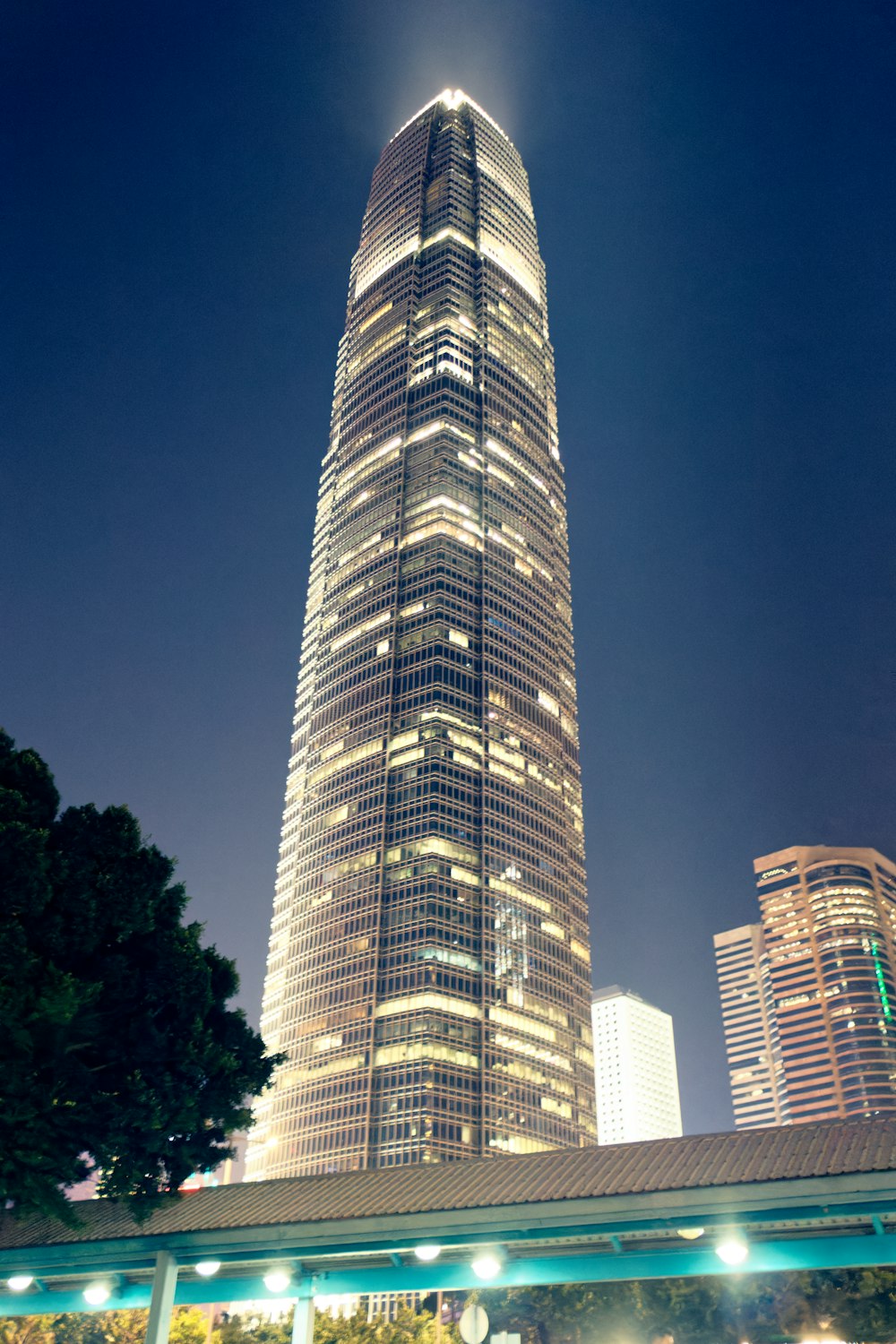 a very tall building lit up at night