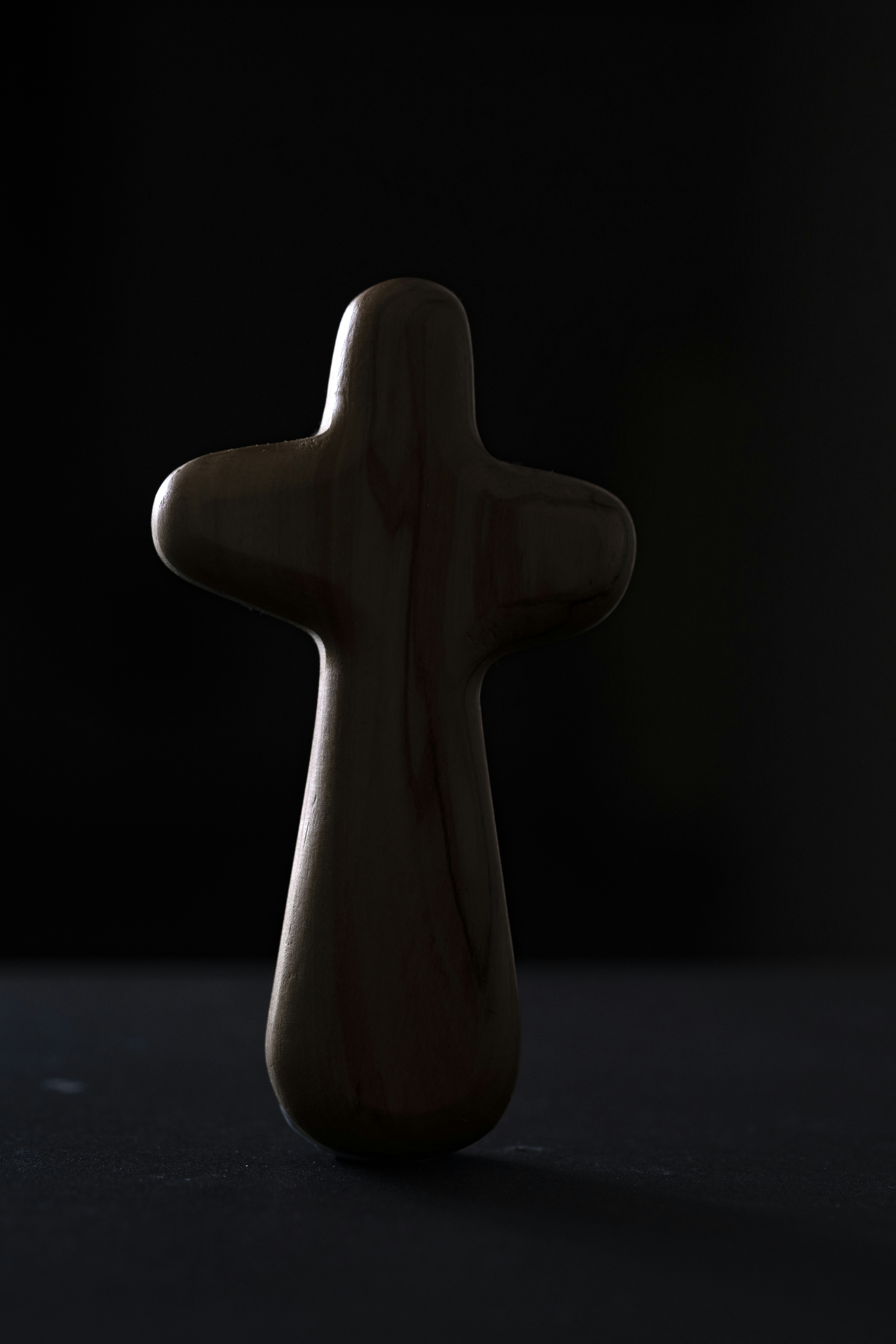 a wooden object sitting on top of a table