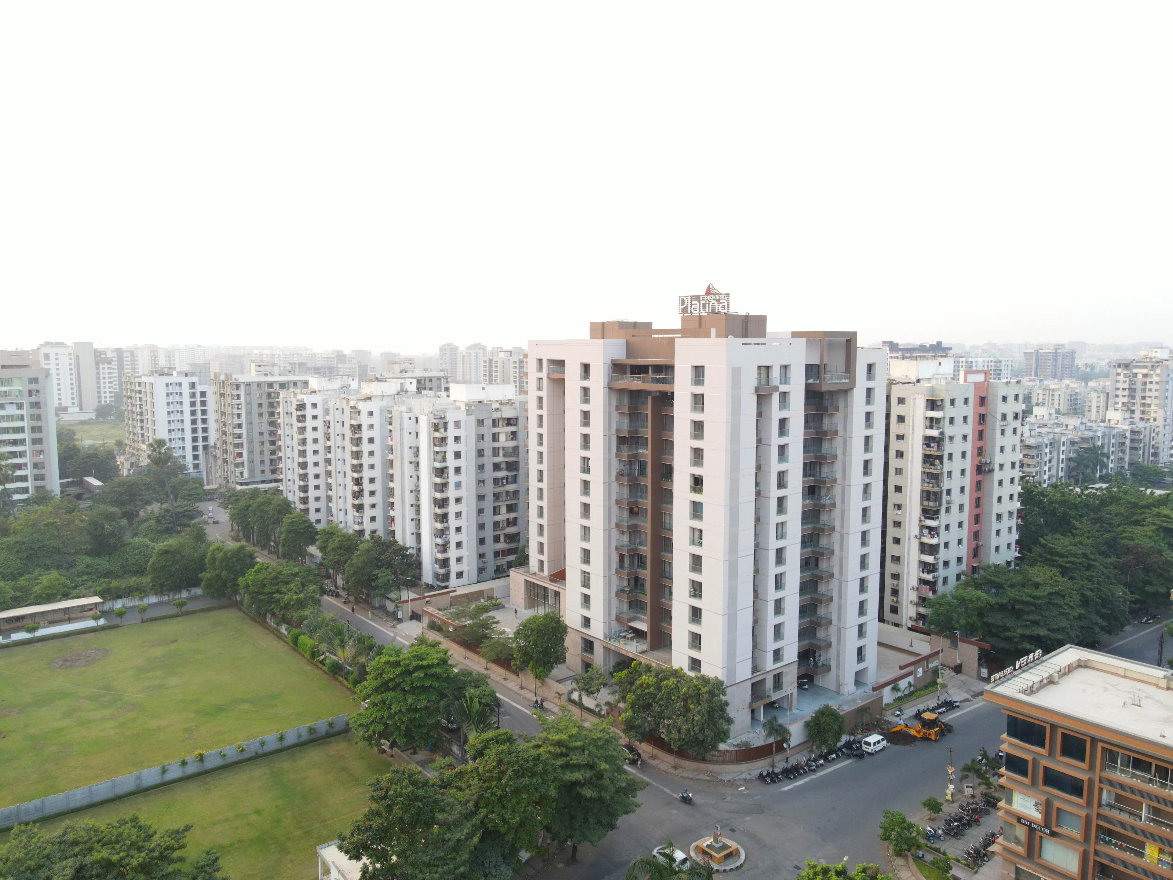 Apartment blocks around a green park in a residential sector