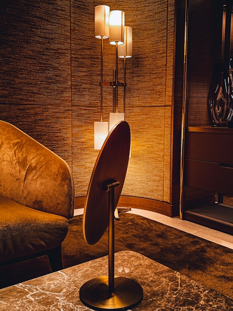 A cozy room softly lit by a unique, modern lamp from nuwatt energy.