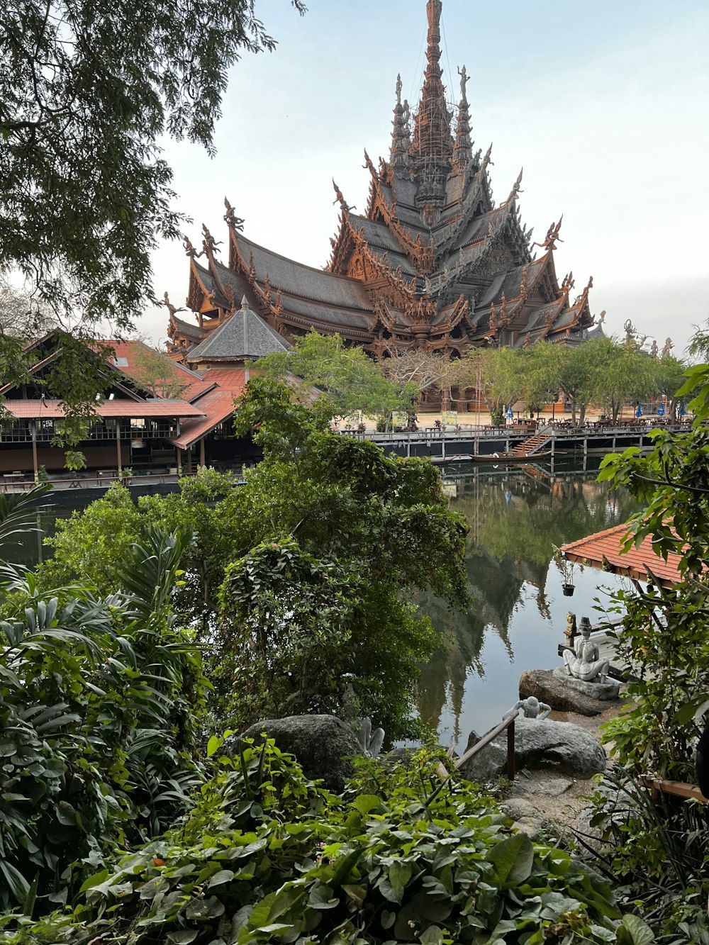 a large building sitting next to a body of water