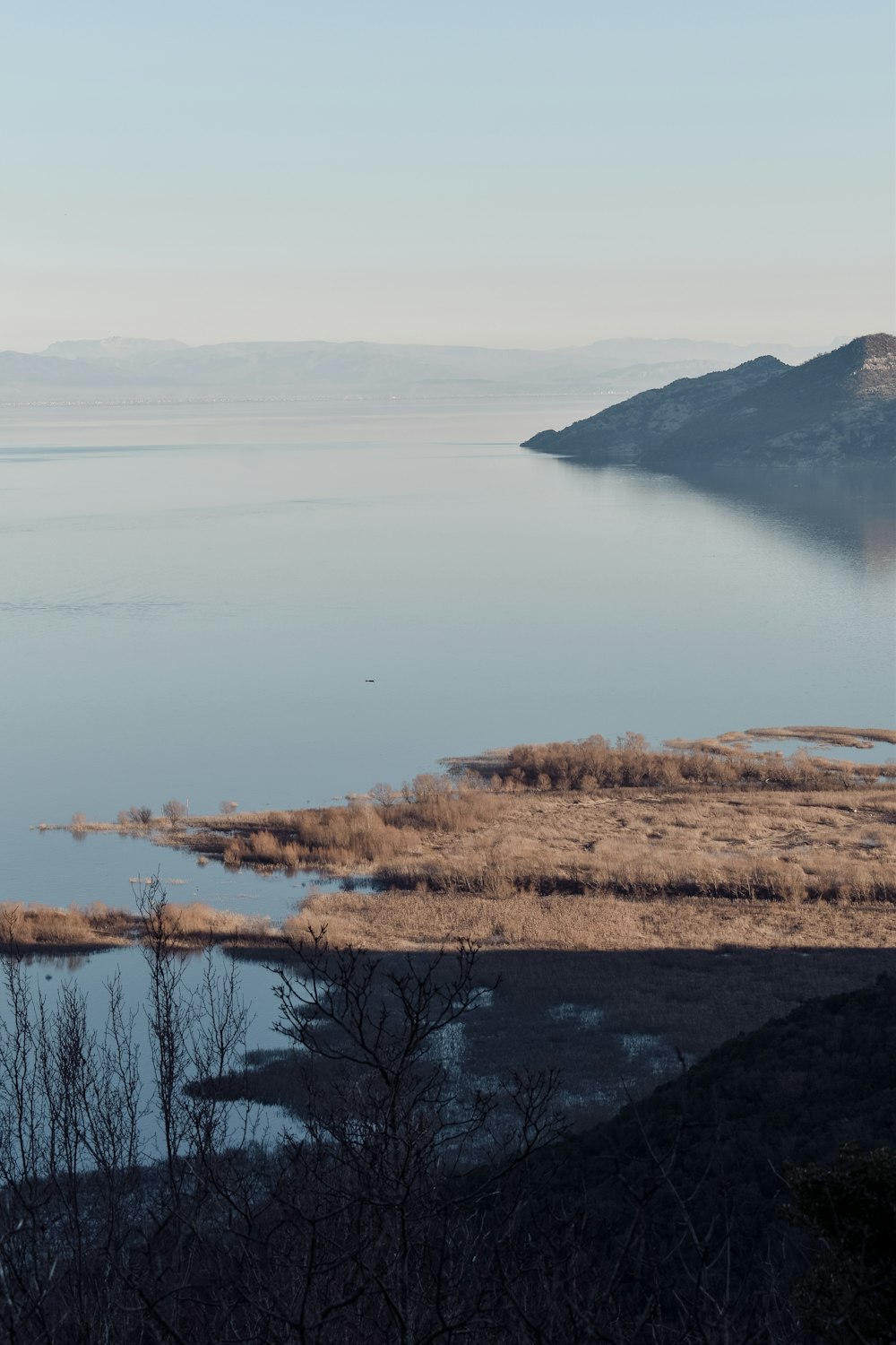 a large body of water surrounded by land