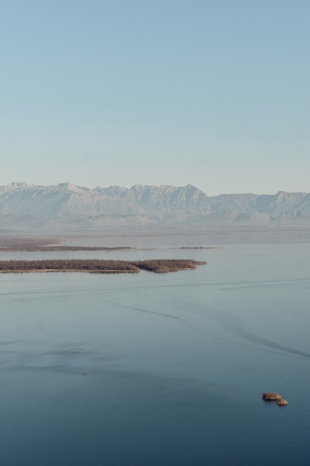 a large body of water surrounded by mountains